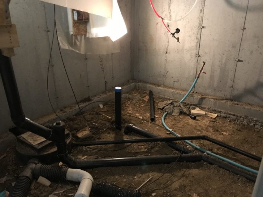 How to finish a basement bathroom with rough in plumbing